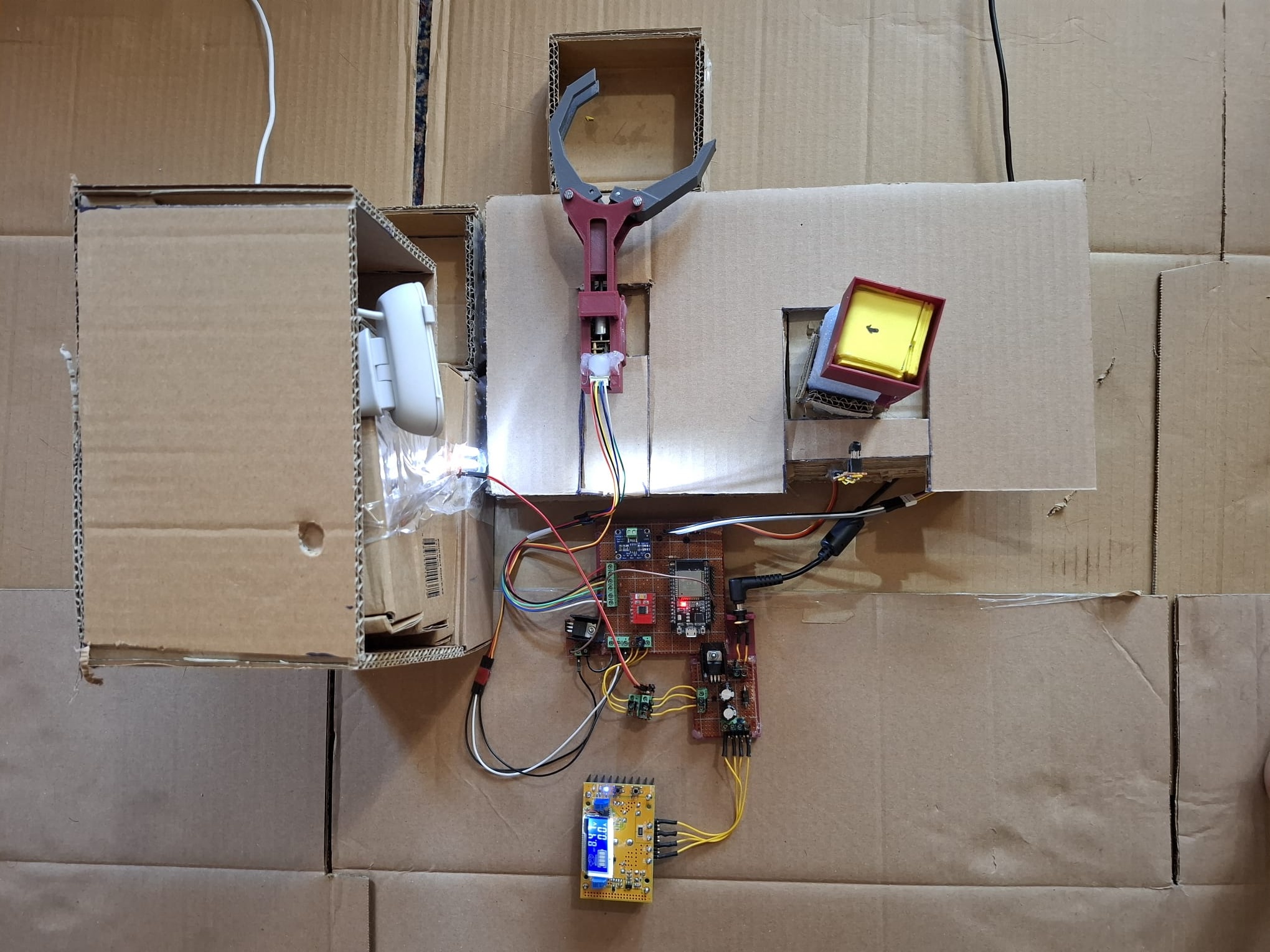 MyoCell sorting cell: leadscrew gripper on a rotation arm, overhead camera, and two sort bins